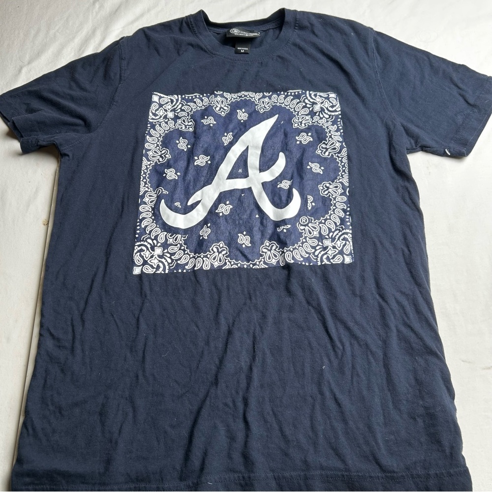 Atlanta Braves Navy Graphic Tee - Men's Crew Neck Shirt. Bandana print graphic.